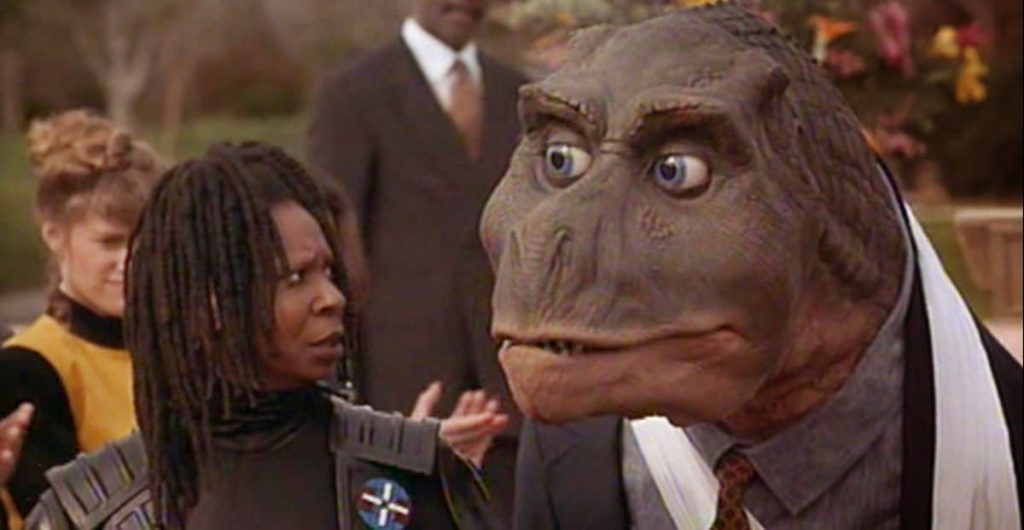Whoopi Goldberg and her dinosaur partner in Theodore Rex