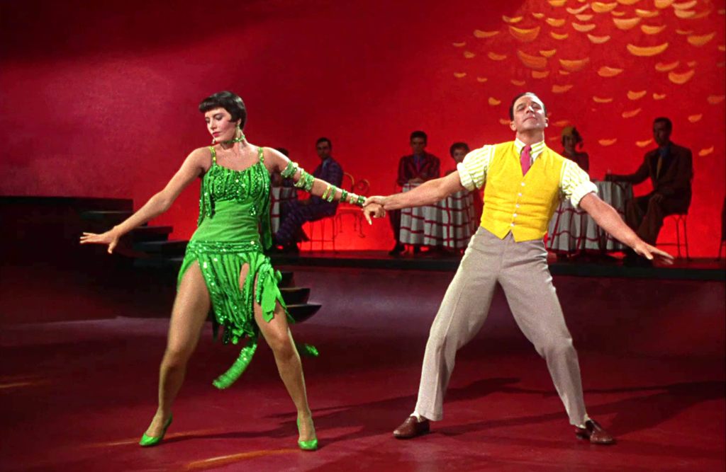 Cyd Charisse and Gene Kelly dancing together in Singin' in the Rain.