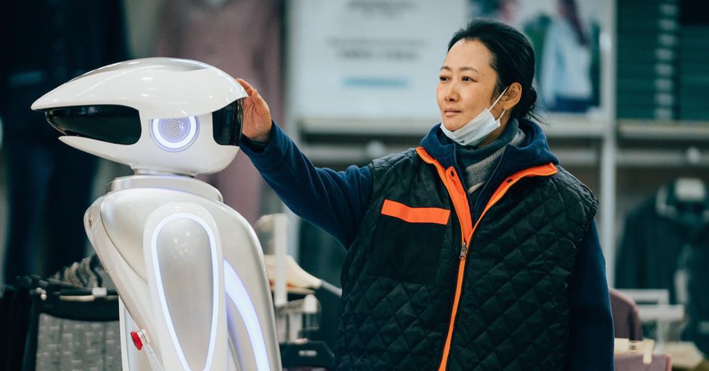 Zhao Tao touches a robot in Caught by the Tides, one of film critic Daniel Barnes' best films of 2025.