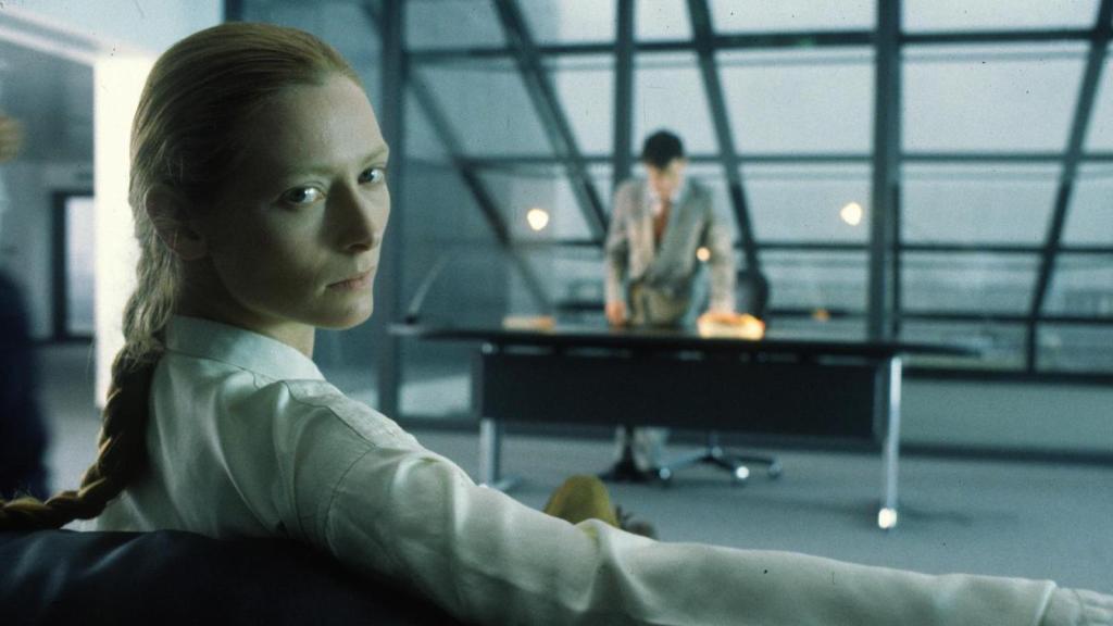 Tilda Swinton looking over her shoulder at the camera in a scene from Orlando (1992).