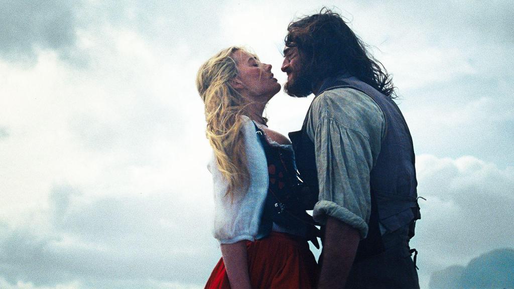 Margot Robbie and Jacob Elordi on the moors in a scene from Wuthering Heights (2026).