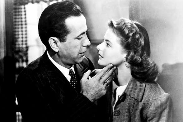 Humphrey Bogart touches Ingrid Bergman's face in a scene from Casablanca (1942).